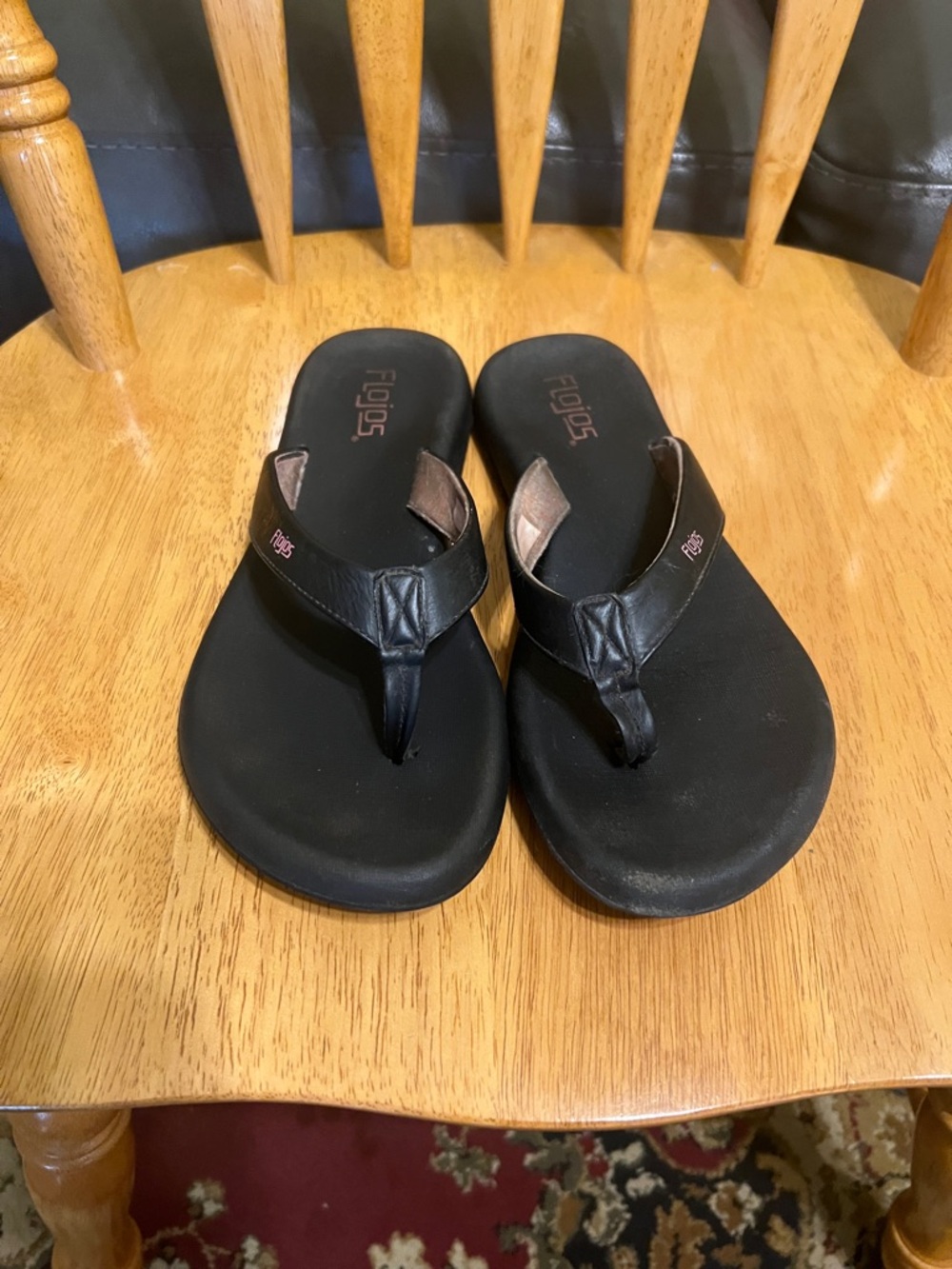 Reef Black Flip Flops with Pink Accents